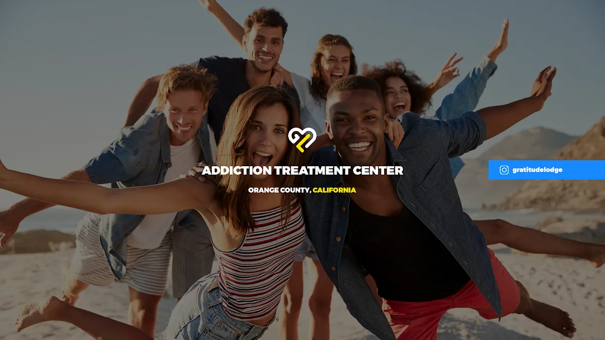 Group of smiling friends at the beach, Gratitude Lodge detox center in Los Angeles.