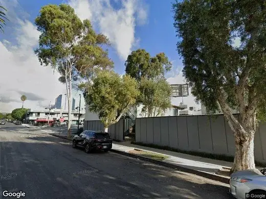 Lush trees lining the street outside The Canyon at Santa Monica, a detox center in Los Angeles.
